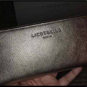 A leather designer clutch